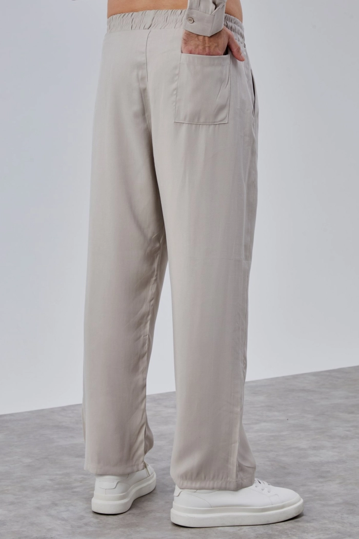 Bej Renk Dökümlü Tensel Pantolon